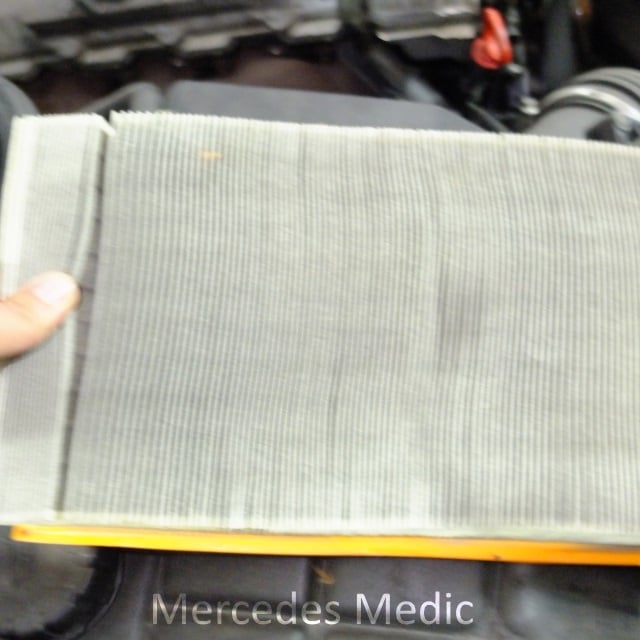 Remove the dirty engine air filter from Mercedes-benz