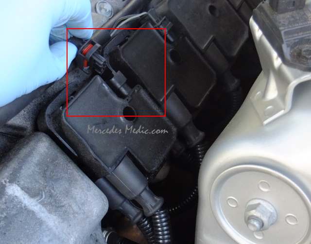 Unplug electrical connector from mercedes igntion coil