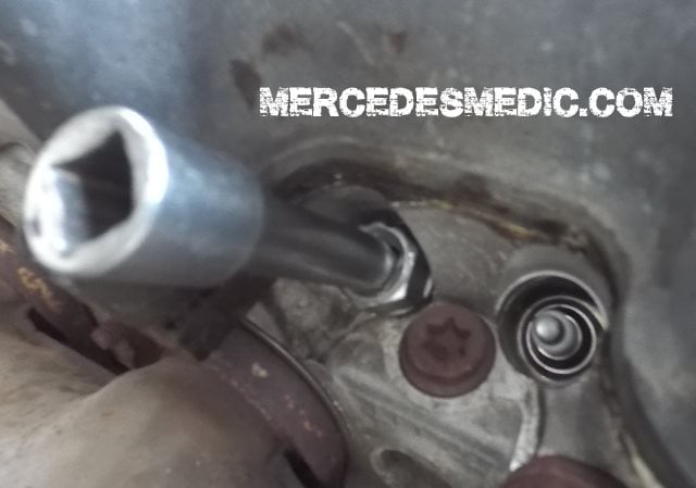 location of installed spark plug remove