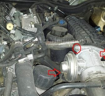 remove bolts and vacum line from egr