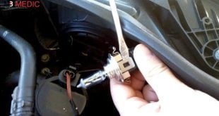 remove old bulb from metal clip