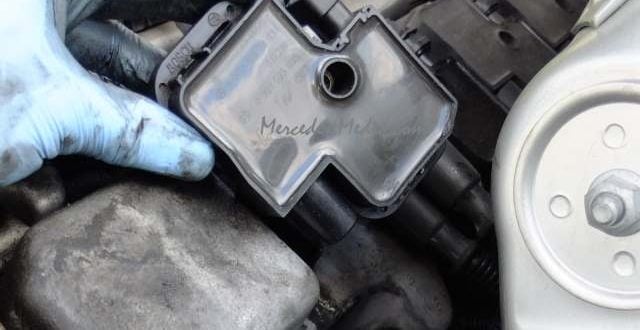 Remove spark plug ignition coil from Mercedes